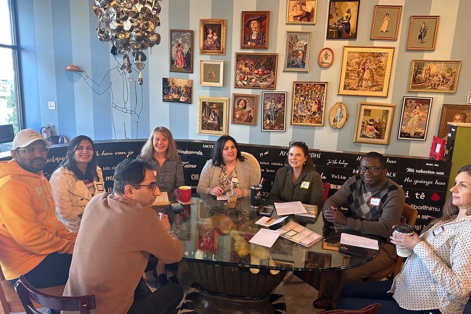 AHF local meetup - members gathered around a table